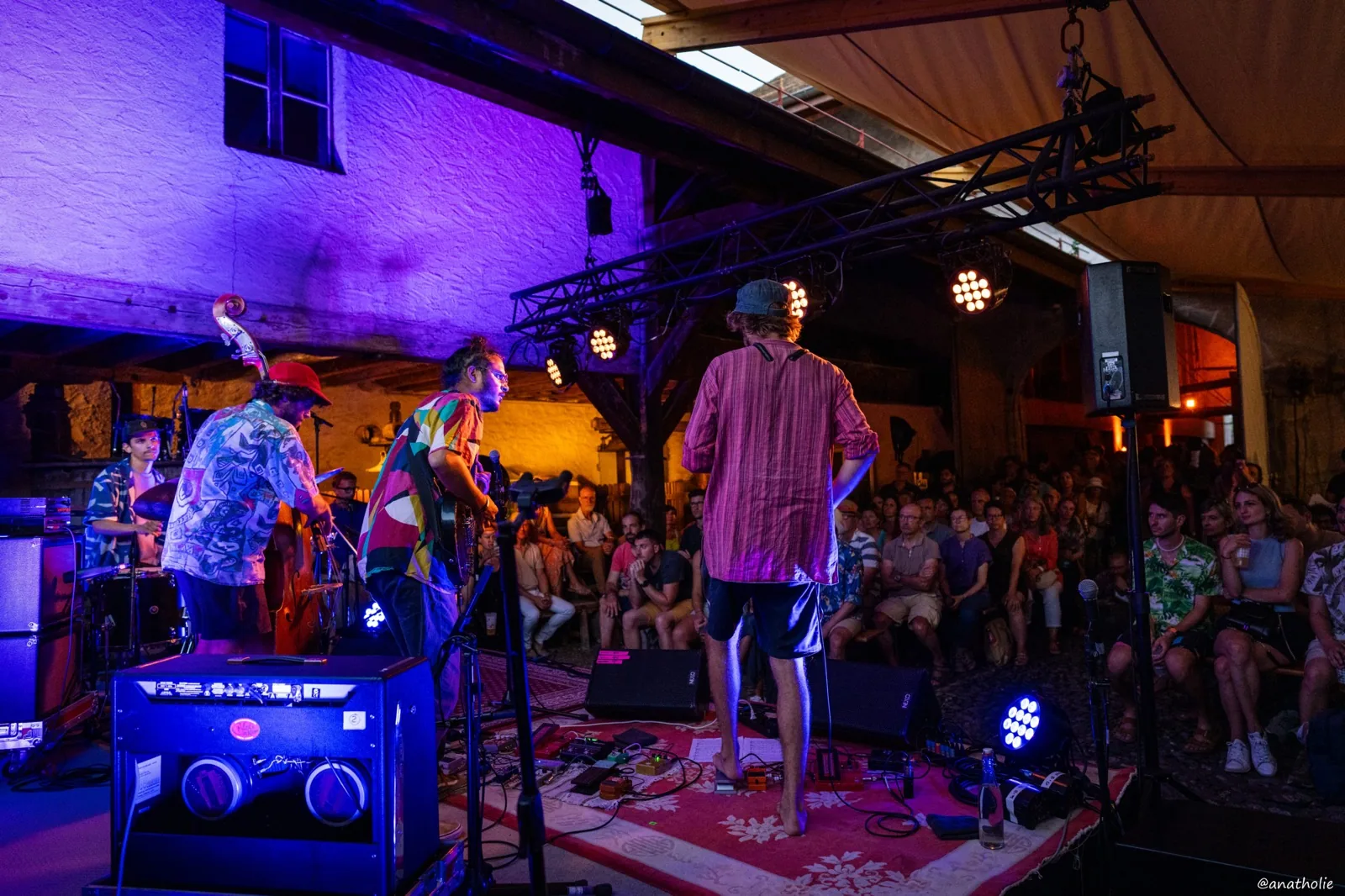 Ravi Ramsahye PROTOTYPE performing live on stage in front of a seated crowd at Jazz sur la Plage, Hermance, 2024